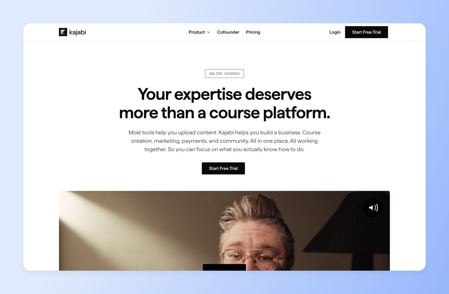 Kajabi online course platform homepage featuring headline about building expertise into a complete business solution with video testimonial